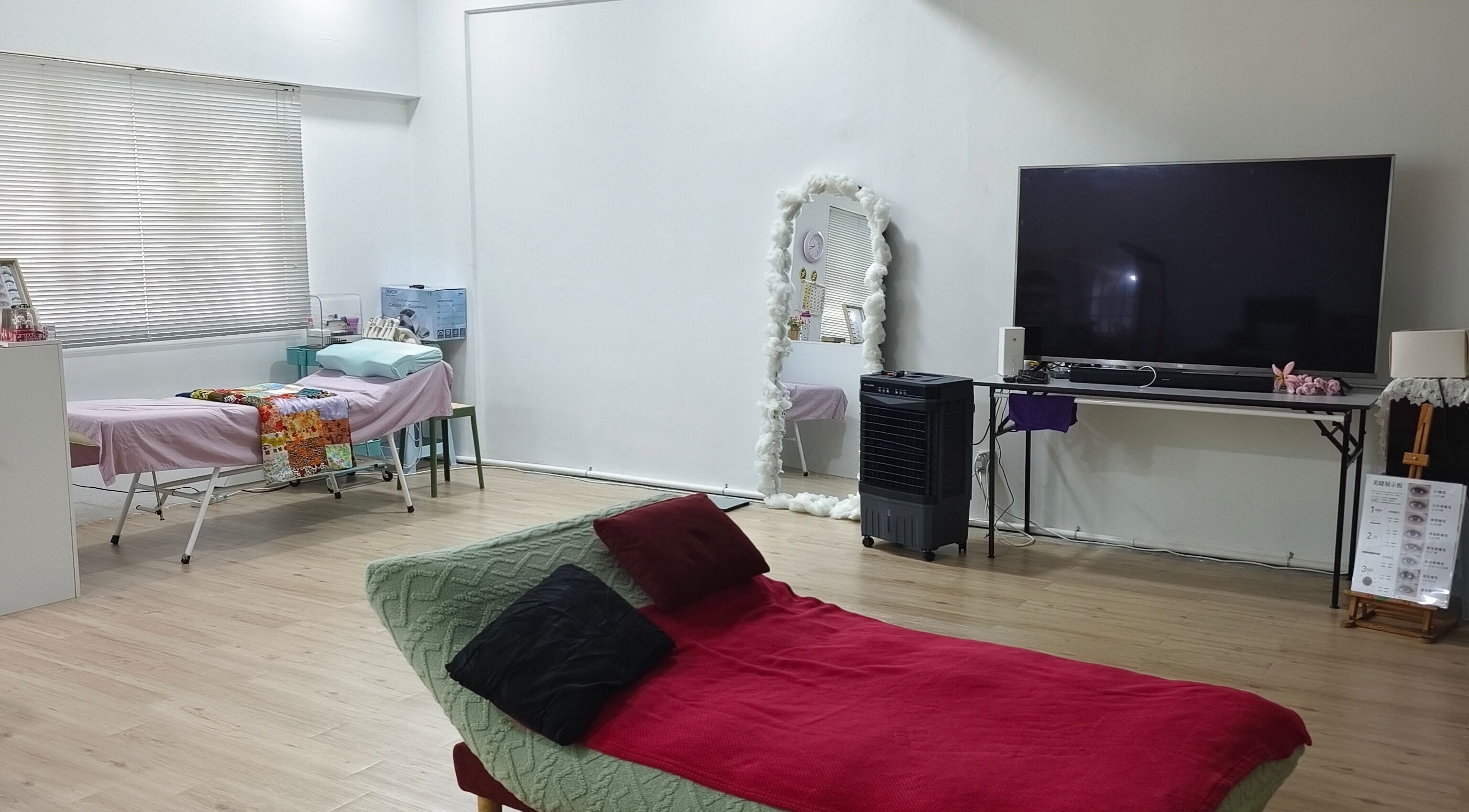 Spacious treatment room at Rainbow Nail Spa in Subang Jaya, Selangor, MY, featuring a cozy setup.
