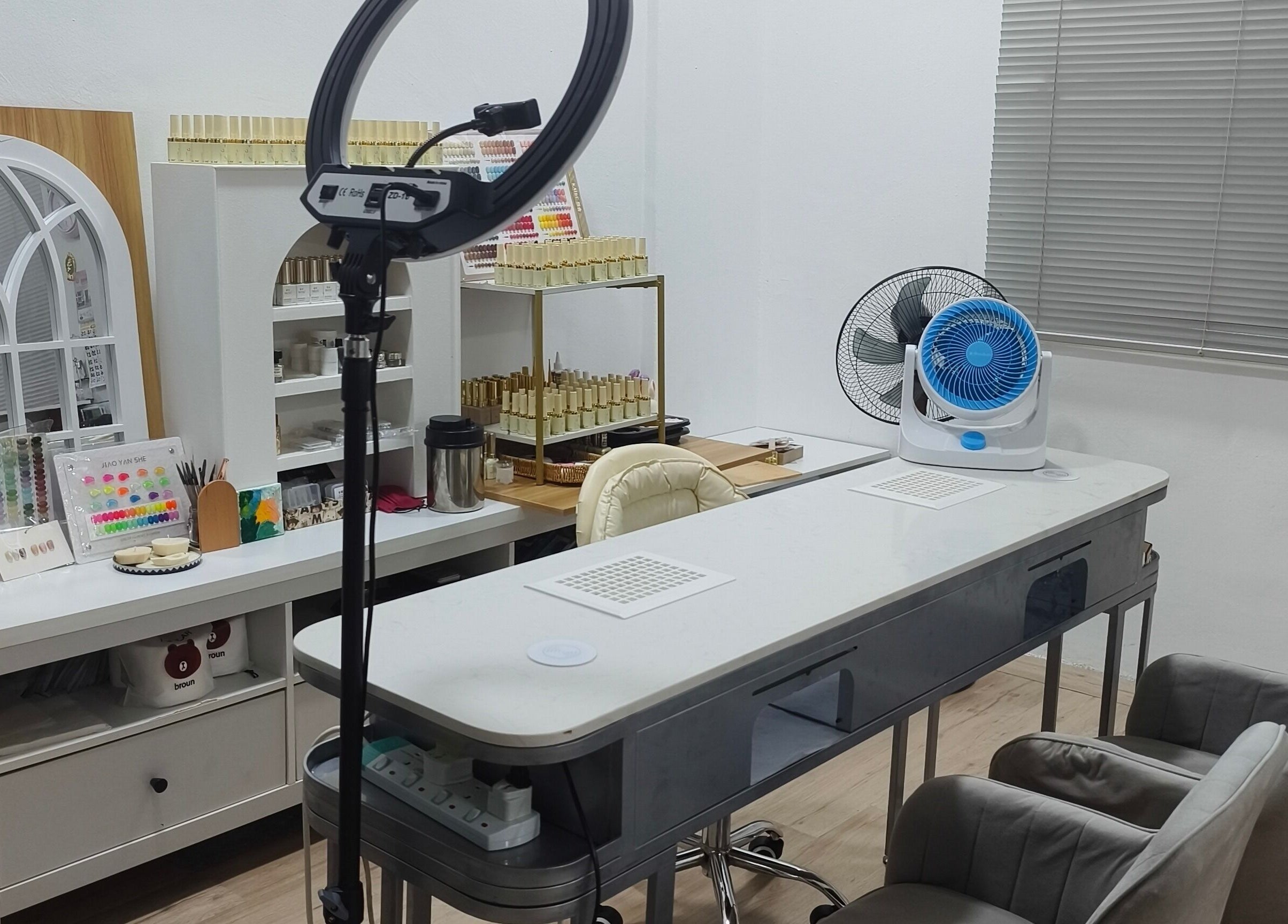 Bright nail station at Rainbow Nail Spa, Subang Jaya, Selangor, MY, showcasing modern design and tools.