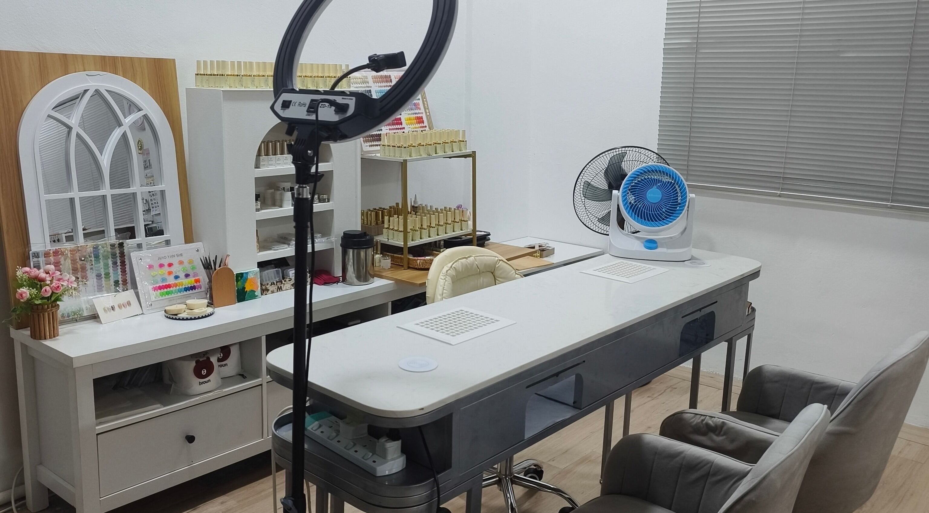 Bright nail station at Rainbow Nail Spa, Subang Jaya, Selangor, MY, showcasing modern design and tools.