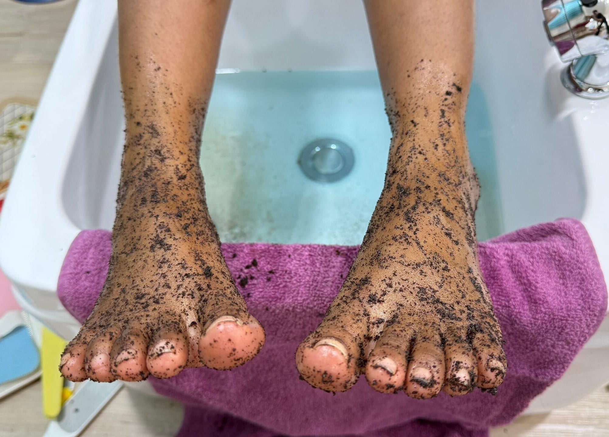 Feet in a relaxing exfoliating soak at Rainbow Nail Spa in Subang Jaya, Selangor, MY.