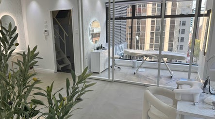 Bright and modern interior of Edge Brows in Sydney, New South Wales, AU, showcasing treatment area and urban view.