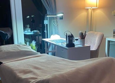 Tranquil spa treatment room at Becky in Frimley Green, England, GB featuring a cozy massage bed.