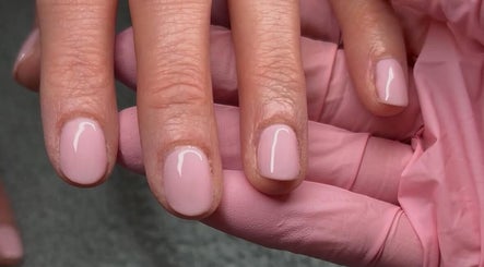 Elegant blush pink manicure at Beauty By Adriana, Eastbourne, England, GB. Perfectly polished nails on display.