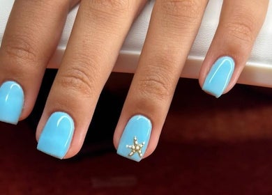 Sky blue manicure with starfish embellishment at Beauty By Adriana, Eastbourne, England, GB.