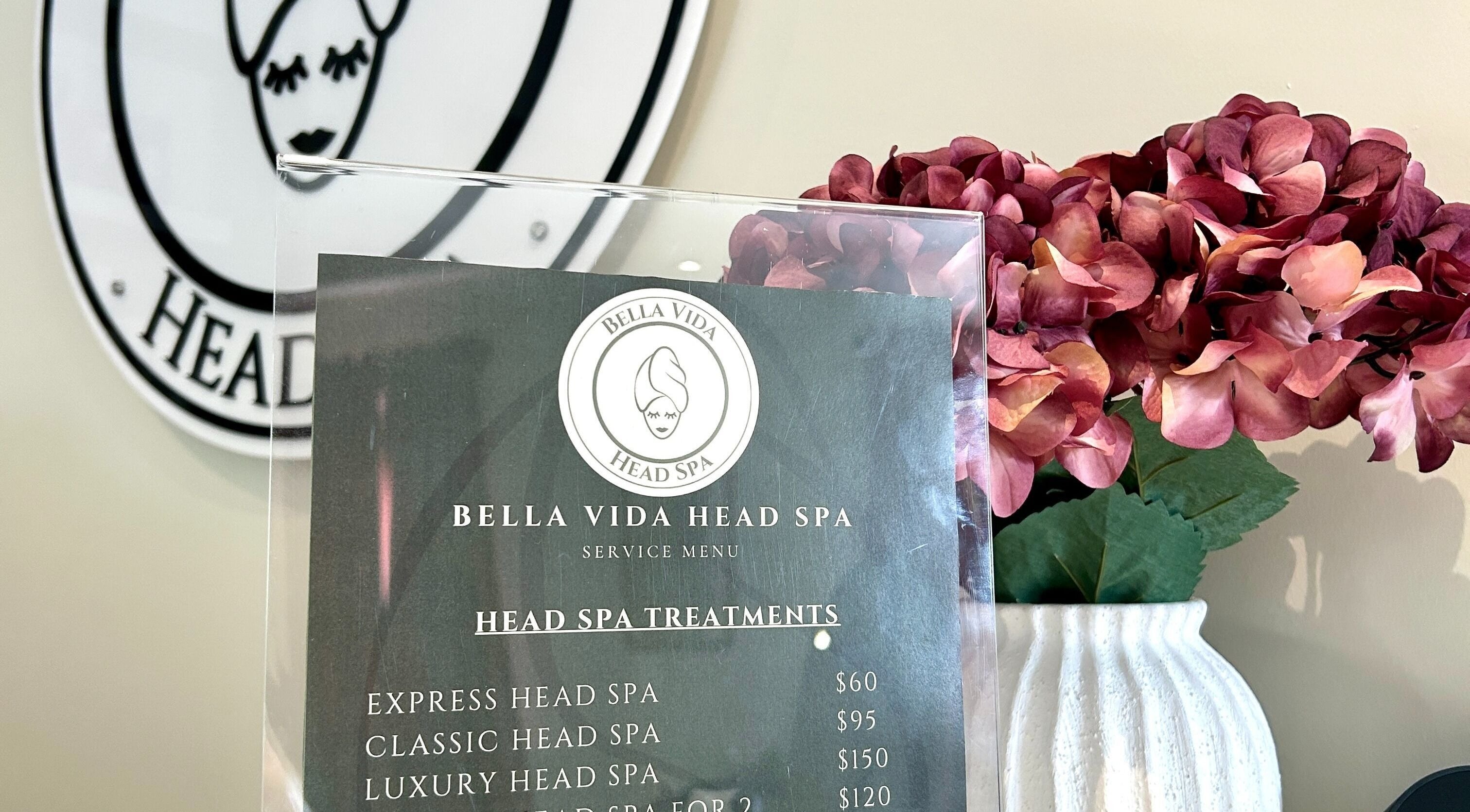Menu of Bella Vida Head Spa with hydrangeas, located in Bowmanville, Ontario, CA.