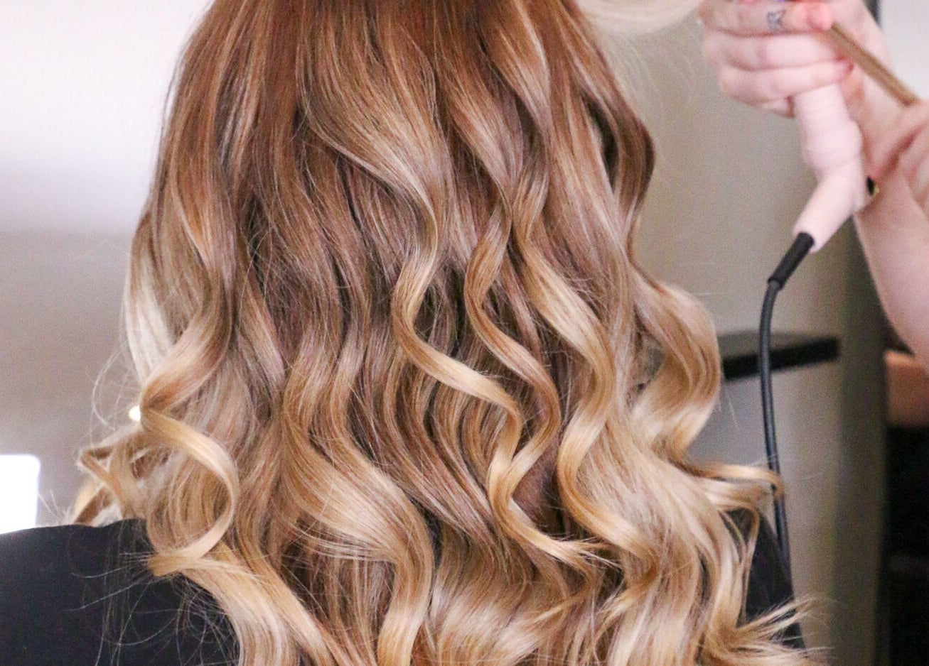 Client's hair being styled into soft waves at Bella Vida Head Spa, Bowmanville, Ontario, CA.