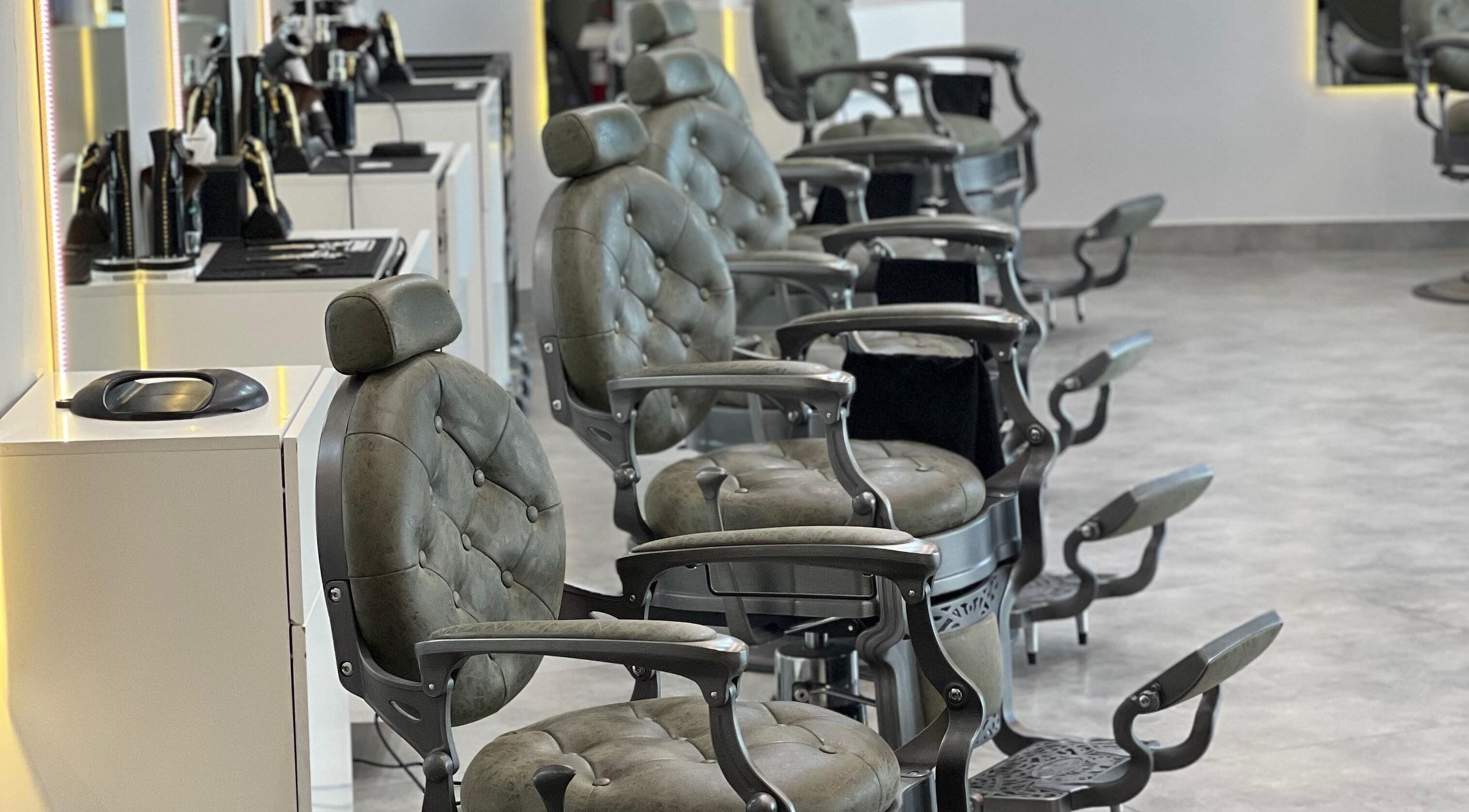 Luxurious barber chairs at Barber Bliss L.L.C, Dubai, Dubai, AE, offering premium grooming services.