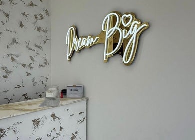 Dream Big neon sign in Hushed Beauty reception, Glasgow, Scotland, GB with chic decor.