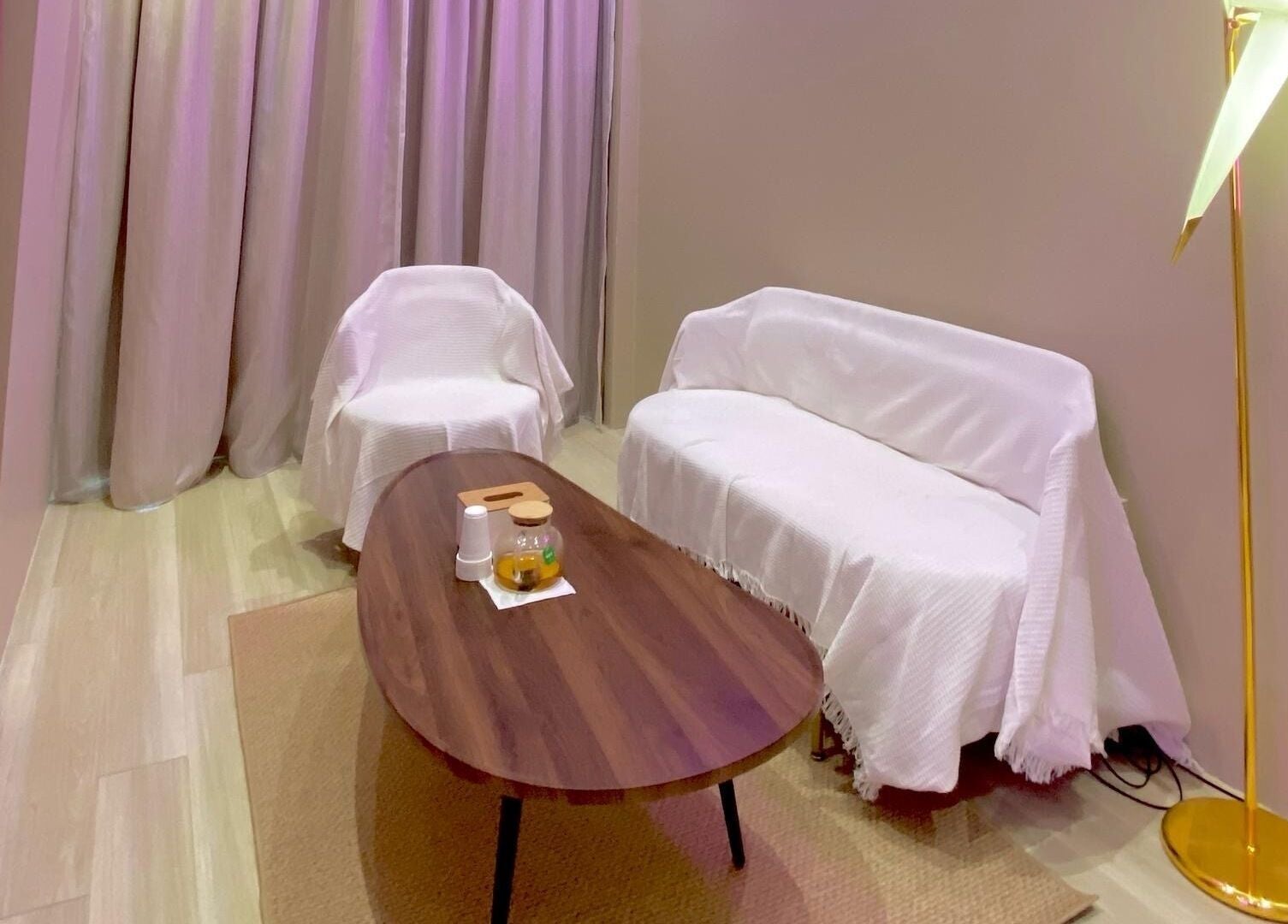 Cozy lounge at Aurora Muslimah Salon & Spa Bangsar, Kuala Lumpur, featuring elegant decor and calming ambiance.