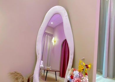 Elegant mirror and floral decor at Aurora Muslimah Salon & Spa Bangsar, Kuala Lumpur, MY.