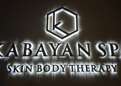 Illuminated sign of Kabayan Boracay Spa in Malay, Western Visayas, PH for skin and body therapy.