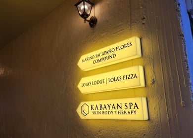 Illuminated signage for Kabayan Boracay in Malay, Western Visayas, PH, guiding visitors to the spa.