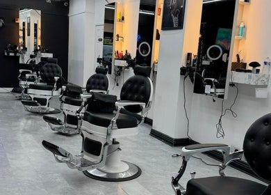 Modern barber chairs in Razortrim, Birmingham, England, GB beauty salon.