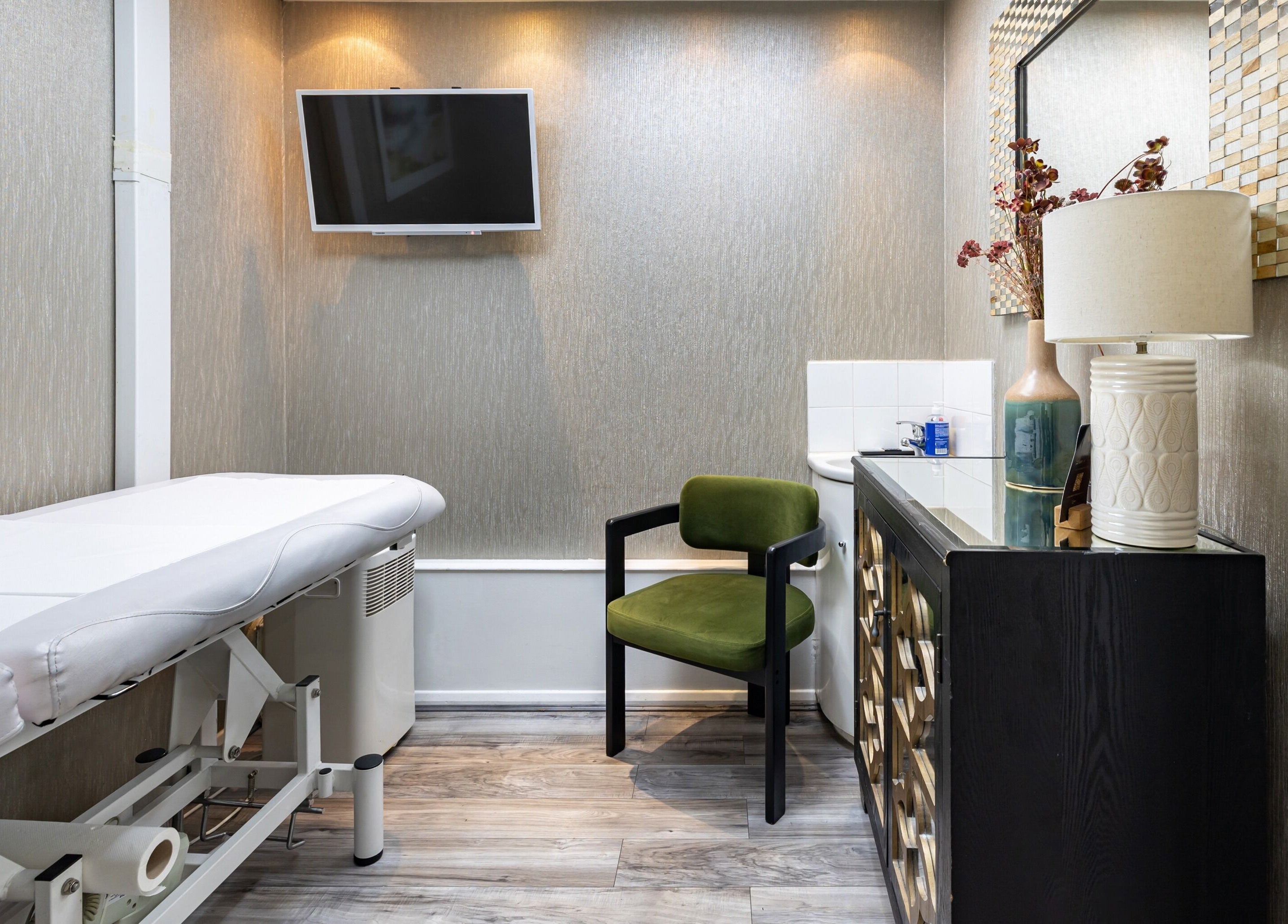 Luxurious treatment room at Luxury Wax Bar - Edgware Road, London, England, GB with modern décor and amenities.