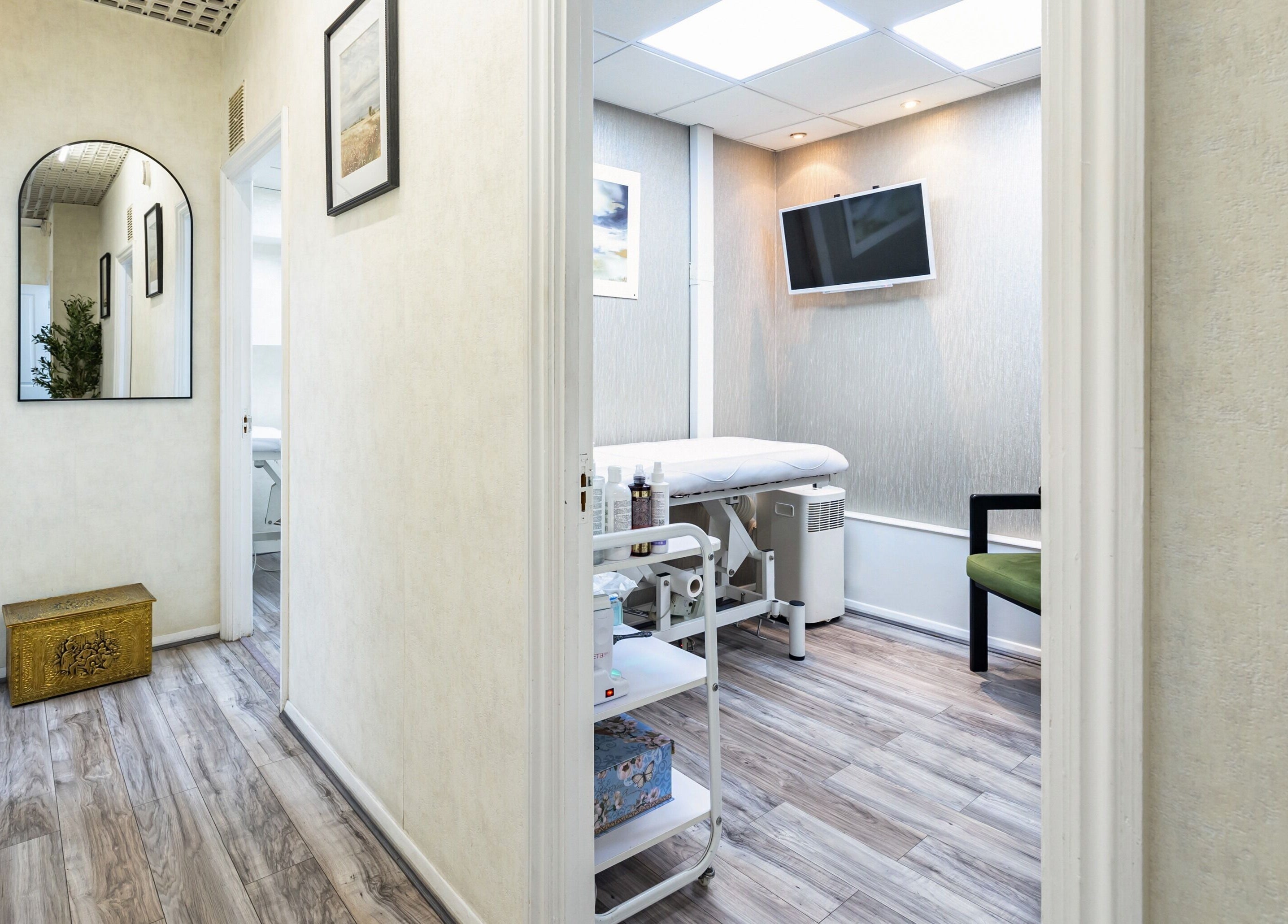 Modern treatment room at Luxury Wax Bar - Edgware Road, London, England, GB with stylish decor and essentials.
