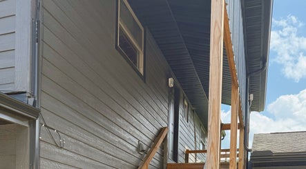 Entrance view of Audreys Afterglow Esthetics and Permanent Cosmetics in Jackson, Ohio, US showcasing rustic elegance.