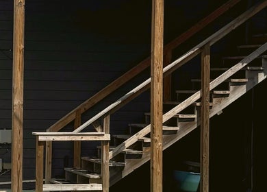 Wooden staircase at Audreys Afterglow Esthetics and Permanent Cosmetics, Jackson, Ohio, US.