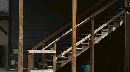 Wooden staircase at Audreys Afterglow Esthetics and Permanent Cosmetics, Jackson, Ohio, US.