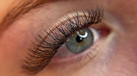 Close-up of eye with enhanced eyelashes at Audreys Afterglow Esthetics and Permanent Cosmetics, Jackson, Ohio, US.