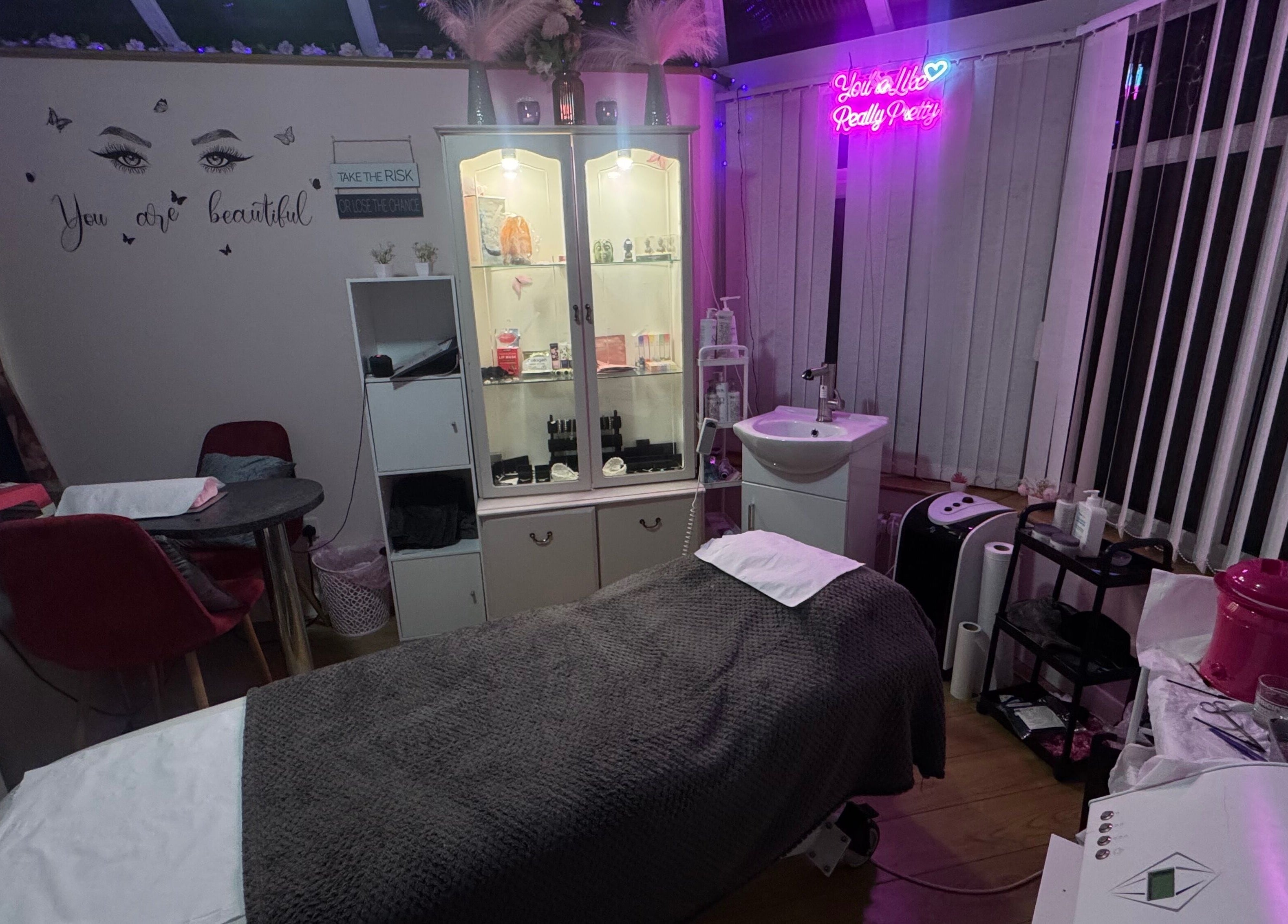 Tranquil treatment room at Absolute Beauty & Aesthetics, North Hykeham, England, GB, showcasing a cozy ambiance.