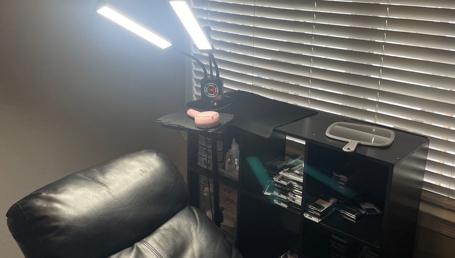 Beauty station at Enhanced Beauty, Florida, Florida, US with leather chair, shelves, and lighting.