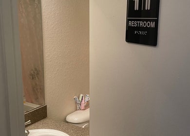 Clean restroom at Enhanced Beauty in Florida, Florida, US with modern amenities for guests.