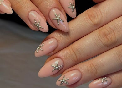 Elegant star-themed nails at Nailsby.S.B, Worthing, England, GB offering expert manicures.