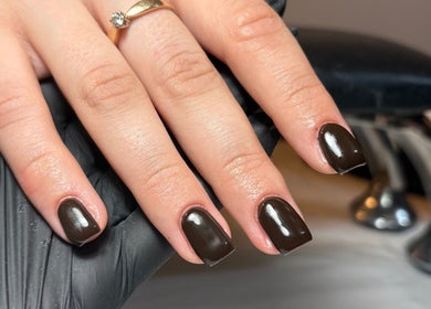 Elegant black nails at Nailsby.S.B, Worthing, England, GB showcase stylish manicure services.