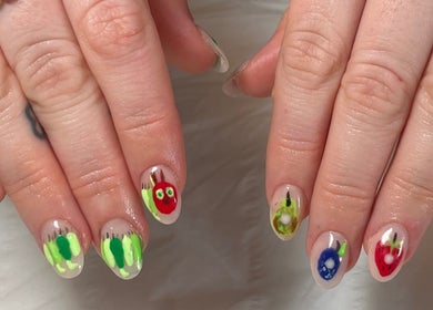 Vibrant nail art at Nailsby.S.B, Worthing, England, GB showcases colorful, creative designs.