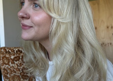 Close-up of a smiling woman with blonde hair at Shannon @ Daisy Bangs, Forster, New South Wales, AU.