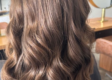 Elegant wavy hairstyle at Shannon @ Daisy Bangs, Forster, New South Wales, AU.