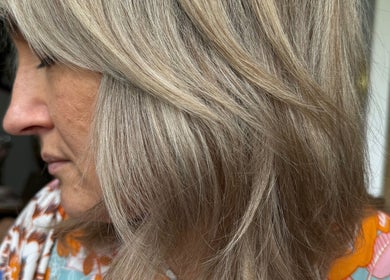 Close-up of a woman's styled hair at Shannon @ Daisy Bangs in Forster, New South Wales, AU.