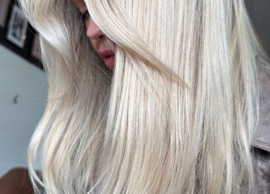 Close-up of sophisticated blonde hair at Shannon @ Daisy Bangs, Forster, New South Wales, AU.