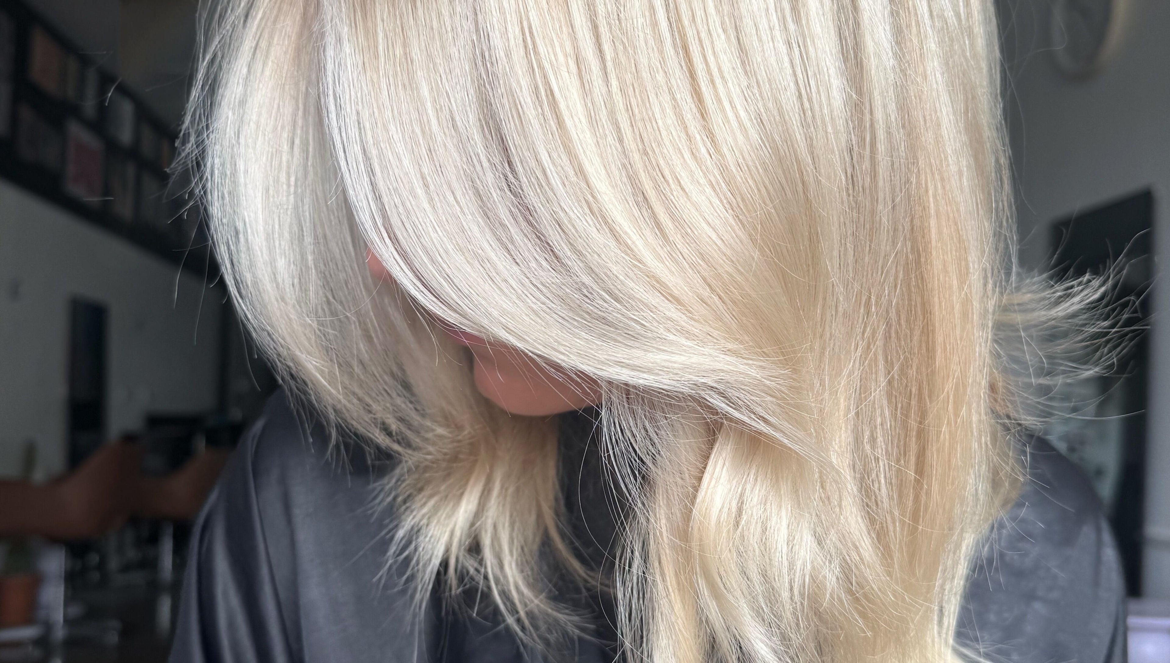 Silky blonde hair styled at Shannon at Daisy Bangs, Forster, New South Wales, AU.