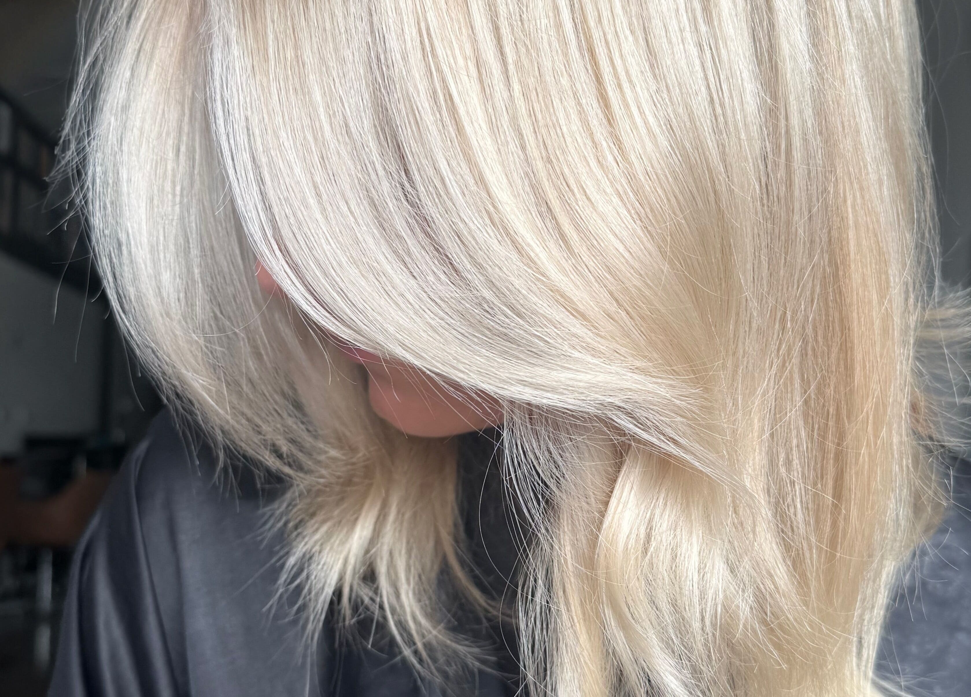 Silky blonde hair styled at Shannon at Daisy Bangs, Forster, New South Wales, AU.