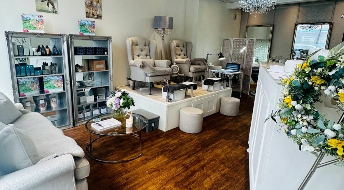 Chic interior of Beautiful You and Co, Long Eaton, England, GB, featuring plush seating and floral decor.