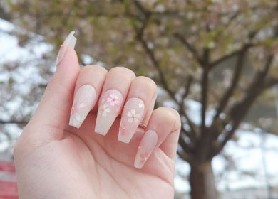 Floral nail art by Vanity Nail Studio in Richmond, British Columbia, CA showcasing delicate flower designs.