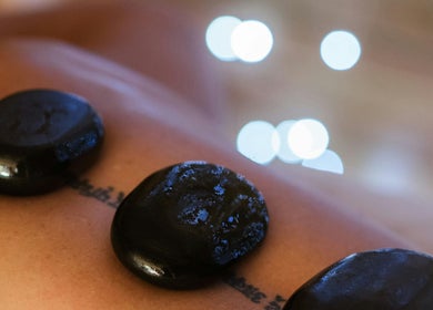 Relaxing hot stone massage at Soothing Senses, Thrapston, England, GB. Perfect for rejuvenation and wellness.