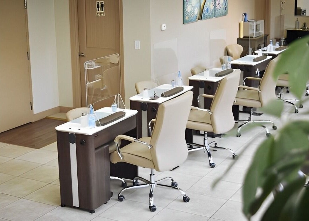 Chic nail stations at Classy Nails in Denver, Colorado, US, provide a relaxing nail care environment.