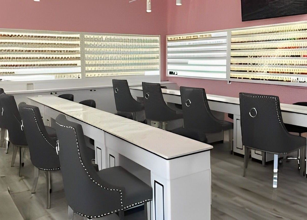 Modern nail salon interior at Natural Nails and Beauty Gisborne, Gisborne, Victoria, AU with sleek chairs and polish displays.