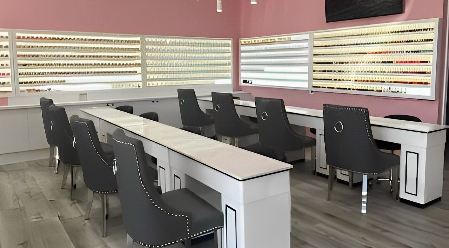 Modern nail salon interior at Natural Nails and Beauty Gisborne, Gisborne, Victoria, AU with sleek chairs and polish displays.