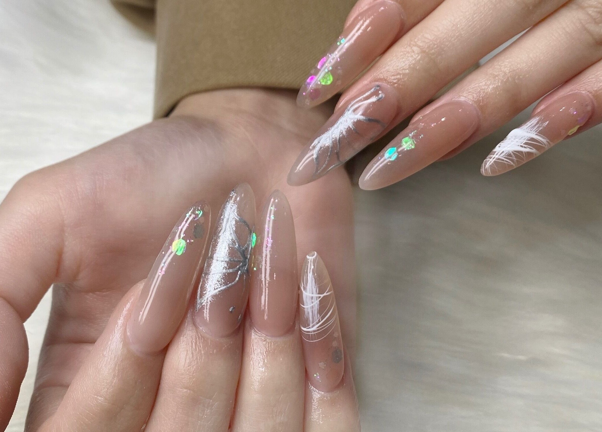 Intricate nail art at Natural Nails and Beauty Gisborne, Gisborne, Victoria, AU, featuring elegant designs.