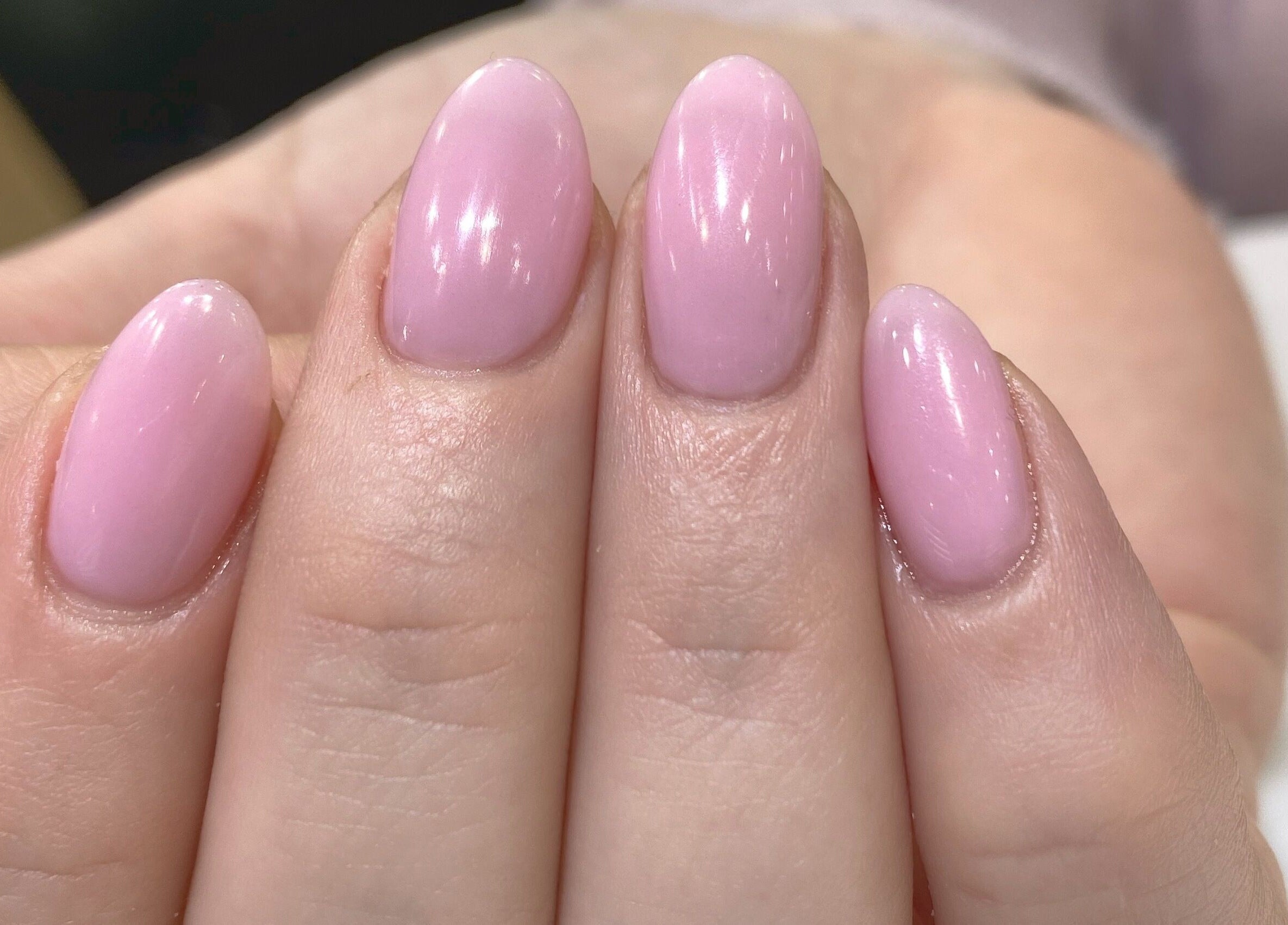 Pastel pink manicured nails at Natural Nails and Beauty Gisborne, located in Gisborne, Victoria, AU.