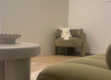 Modern lounge area at Eve Soleil, Dapto, New South Wales, AU featuring elegant seating and minimal decor.