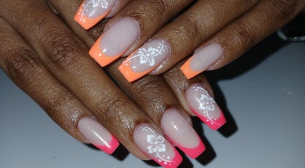 Beautiful floral nail art with vibrant tips at DBeautyHouse, Penal/debe Regional Corporation, TT.