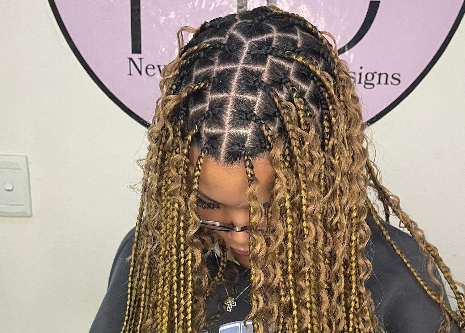 Intricate braids design at Beauty Beyond Expectation in Windhoek, Khomas Region, NA showcases hairstyling excellence.