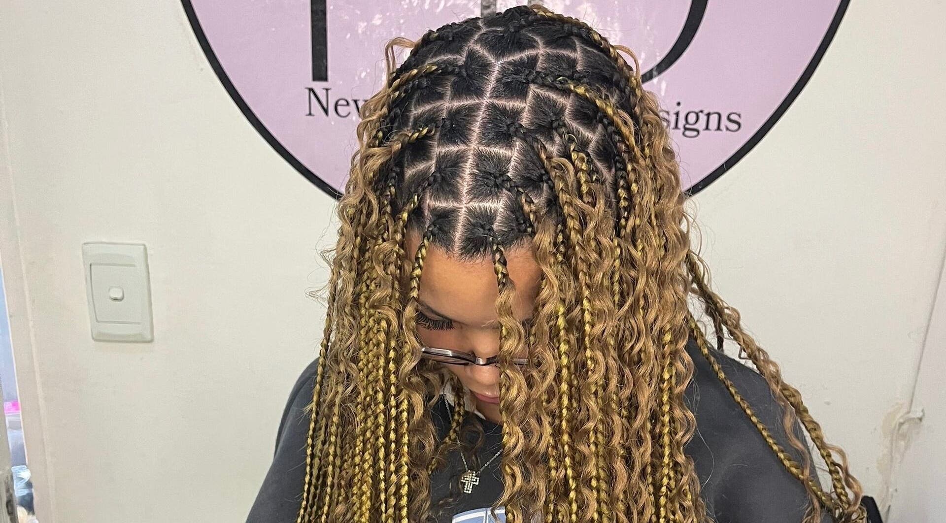 Intricate braids design at Beauty Beyond Expectation in Windhoek, Khomas Region, NA showcases hairstyling excellence.