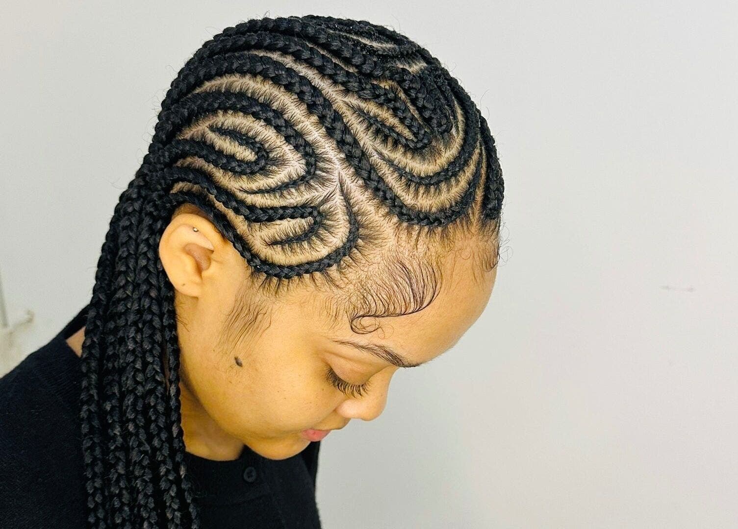 Intricate braided hairstyle at Beauty Beyond Expectation, Windhoek, Khomas Region, NA.