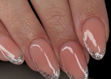 Elegant glitter-tipped nails at Nails by Evie in Plymouth, England, GB.