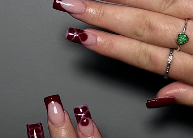 Stylish burgundy nail art at Nails by evie, Plymouth, England, GB. Perfect for a chic and elegant look.